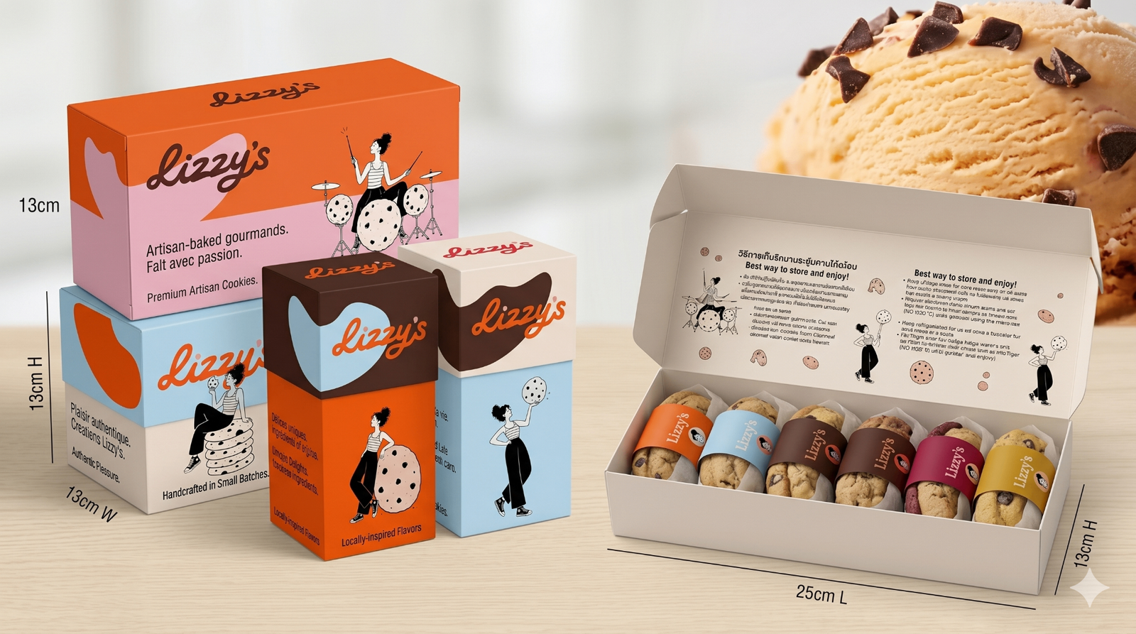 Stack of Lizzy's cookie boxes in orange, pink, cream and brown